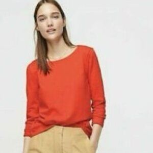 J Crew long sleeve orange cotton top with knot on back size Large